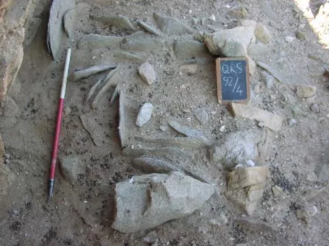 Remains of storage cairn © Photo: J. Kinahan